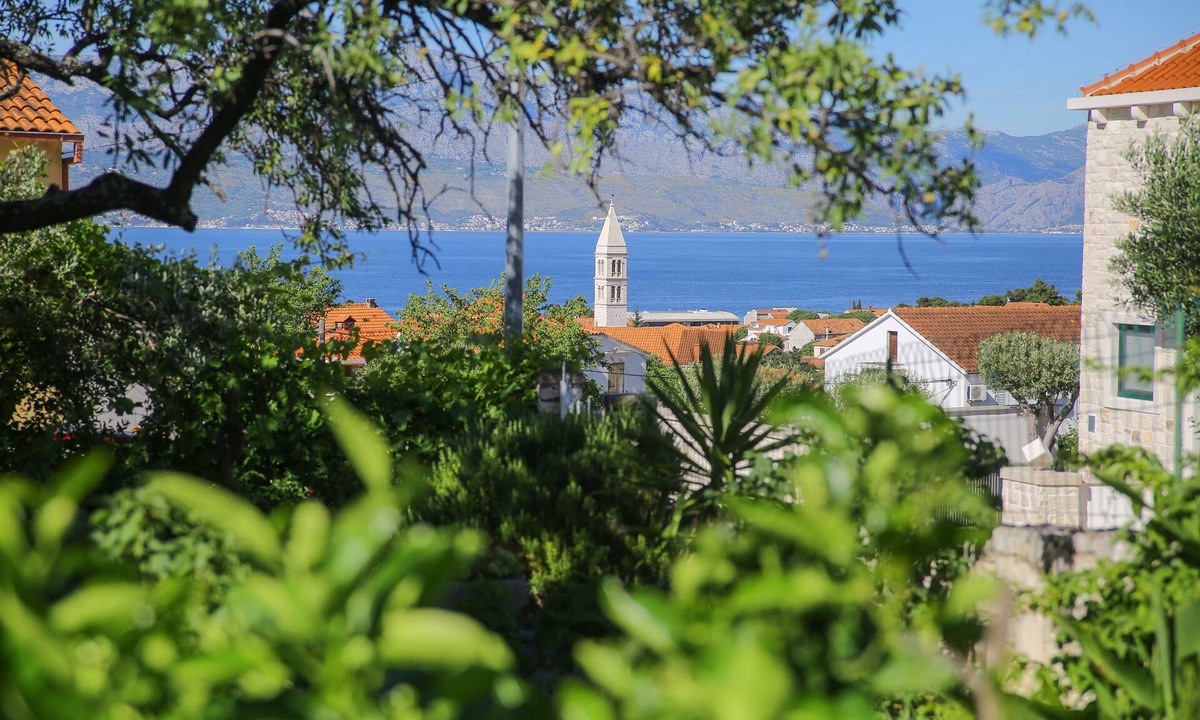 Supetar House | Entire artistic house with organic garden, terrace with sea view and fire place