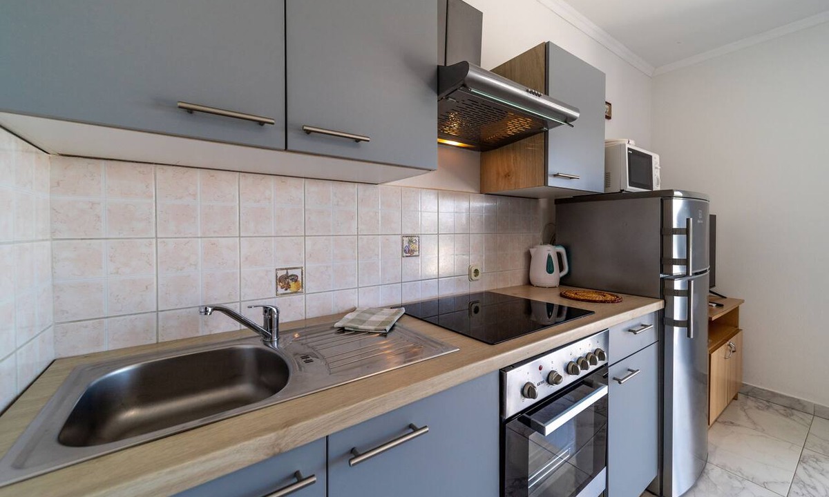 Kampor Apartment | Two bedroom apartment with a swimming pool Kampor, Rab (A-23600-b)