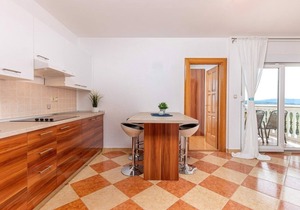 Holiday apartment with sea view and pool in Dramalj