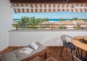 Popular fully equipped modern one bedroom apartment in a top location in Porec near the beach and with sea view in Porec