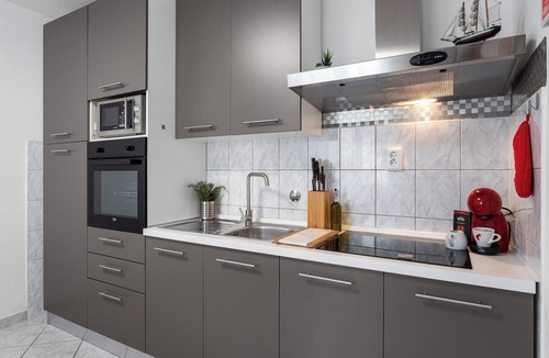 Duce Apartment | Apartment Miroslav near sandy beach with patio, bbq, garden and free parking