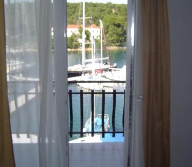 Vrboska Apartment | Apartments Dora, with a beautiful view of the bay, near the sea and center