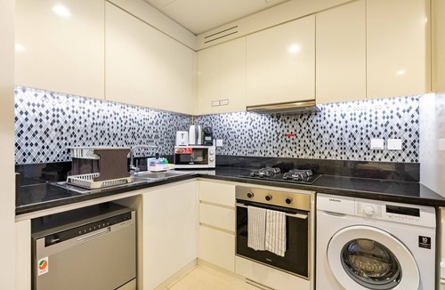 Sheikh Zayed Road Apartment | Boho-Styled Top-Floor 2BR by the Waterfront, Close to Marine Transport Station
