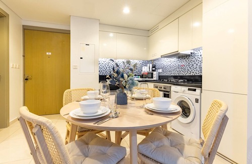 Sheikh Zayed Road Apartment | Boho-Styled Top-Floor 2BR by the Waterfront, Close to Marine Transport Station