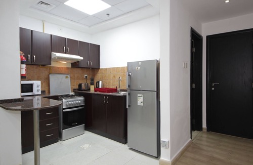 Jumeirah Village Circle Apartment | BRIGHT AND UPSCALE FULLY FURNISHED 1BHK IN JVC