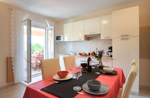 Gulici Apartment | Charming flat with large pool, private balcony, BBQ, only 800 metres to the beach
