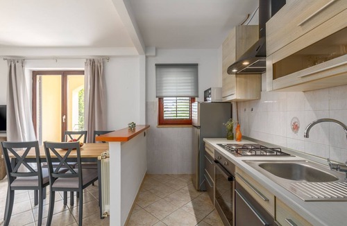 Susnjici Apartment | Dog-friendly apartment with pool, children's playground, outdoor kitchen, barbecue