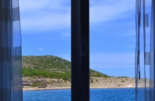 Vinjerac Apartment | Duplex-Apartment mit Blick auf das Meer und den Garten by Interhome