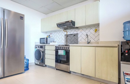 Dubai Production City Apartment | Elite LUX Holiday Homes - Modern 1BR Resort Amenities in Production City