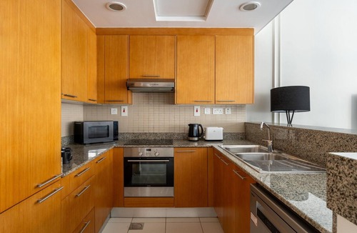 Business Bay Apartment | GuestReady | Studio | Partial Burj Khalifa View