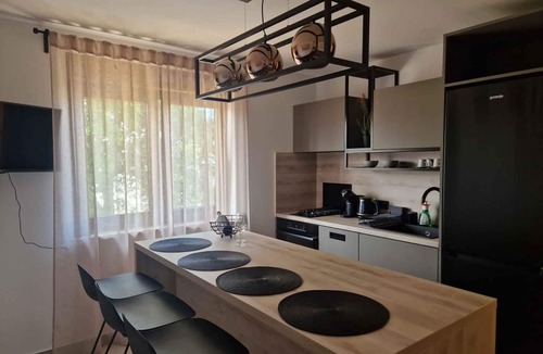 Funtana Apartment | Holiday apartment modernly furnished with shared garden and barbecue
