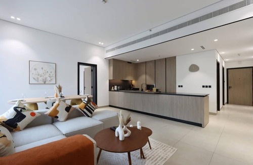 Dubai Production City Apartment | Livbnb-Stylish and Spacious 1B w/Private Balcony