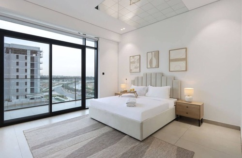 Dubai Production City Apartment | Livbnb-Stylish and Spacious 1B w/Private Balcony