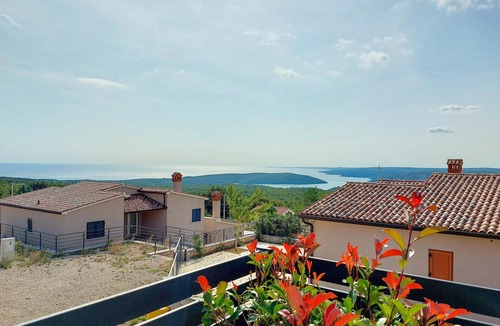 Stanisovi House | Look forward to a vacation in a modern vacation home with an enchanting view of the sea.