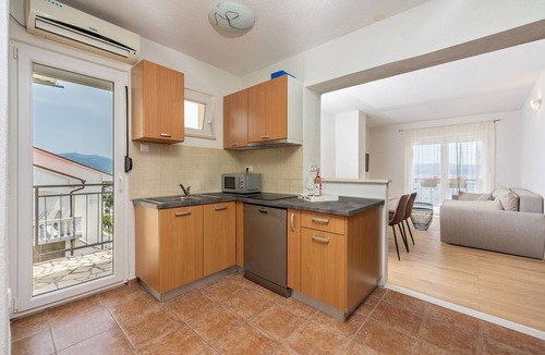 Novi Vinodolski Apartment | Modern flat just 300 metres from the beach with sea views, pool, barbecue - dog-friendly