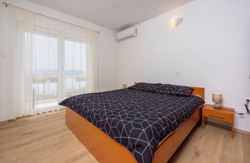 Novi Vinodolski Apartment | Modern flat just 300 metres from the beach with sea views, pool, barbecue - dog-friendly