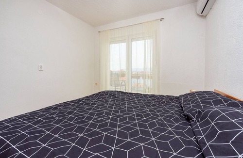 Novi Vinodolski Apartment | Modern flat just 300 metres from the beach with sea views, pool, barbecue - dog-friendly