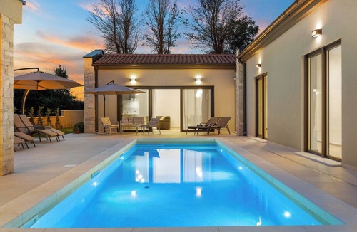 Loborika Villa | Modern Istrian Villa Teva near Pula in Istrian style by Istrabook