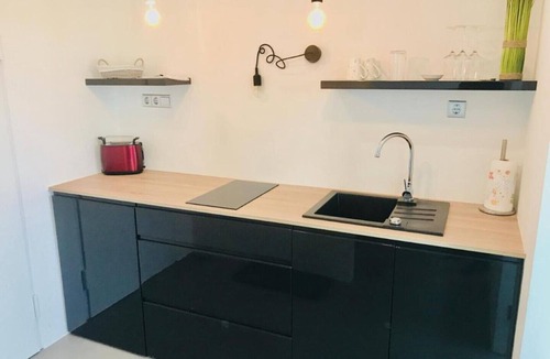 Center Apartment | Modern Studio in the Heart of Maribor with Stunning Sunset Views