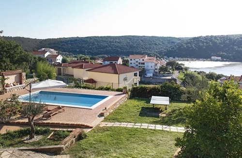 Kampor Apartment | One bedroom apartment with a swimming pool Kampor, Rab (A-15518-c)
