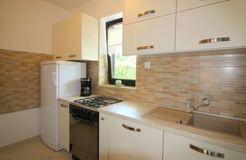 Brulo House | Pinia in Strandnähe mit Garten by Interhome