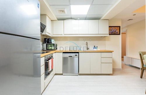 The Greens Apartment | Quiet 2BR Haven Steps from The Greens Lakes and Emirates Golf Club, Al Dhafrah 2, The Greens by Deluxe Holiday Homes