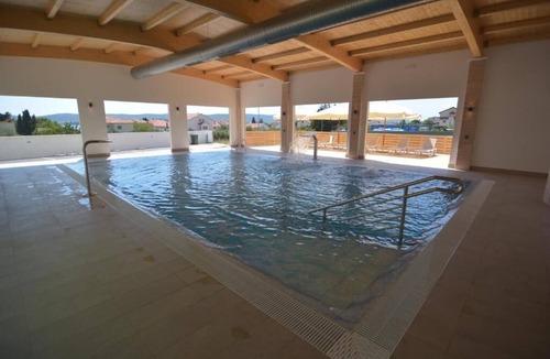 Sveti Filip i Jakov Apartment | Rubinić A3, 200m to the beach, indoor heated pool, 4 people, free WiFi, parking