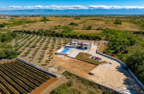 Nin Villa | Rustic Villa Perosa With Heating Pool