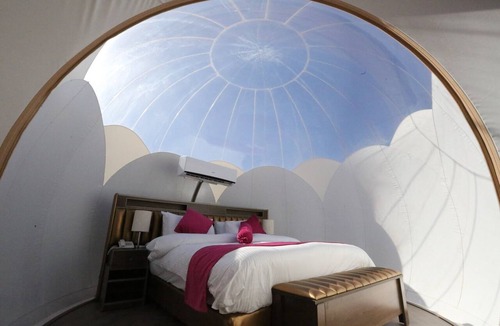 Wadi Musa Hotel | Sleep in Petra under the stars and enjoy your own hot tub.