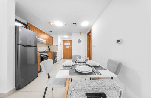 Dubai Production City Apartment | StayShort - Comfortable 1 Bedroom in Production City that Sleeps 3!