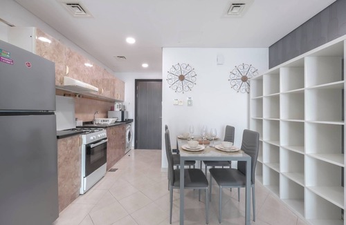 Dubai Production City Apartment | StayShort - Cozy & Quiet Studio in Production City for 3