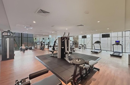 Dubai Sports City Apartment | StoneTree - Spacious Studio - The Matrix