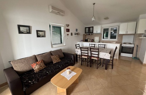 Blace Apartment | Stylish Family Retreat with Stunning Sea Views, Terrace & Steps to the Beach