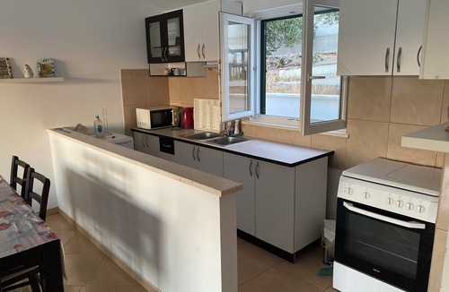 Blace Apartment | Stylish Family Retreat with Stunning Sea Views, Terrace & Steps to the Beach