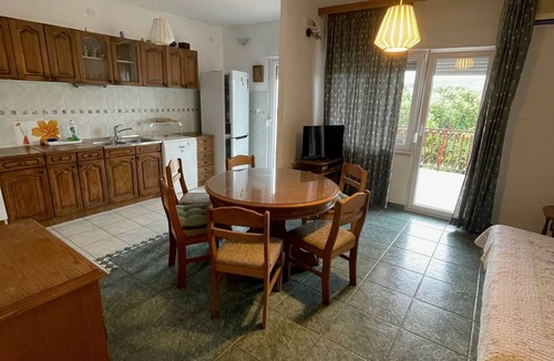 Seget Vranjica Apartment | Three bedroom apartment with terrace and sea view Seget Vranjica, Trogir (A-12760-d)