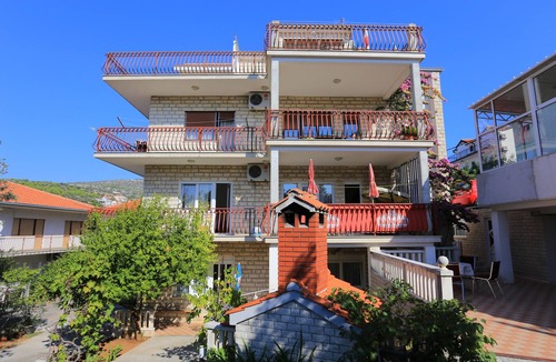 Seget Vranjica Apartment | Three bedroom apartment with terrace and sea view Seget Vranjica, Trogir (A-12760-d)