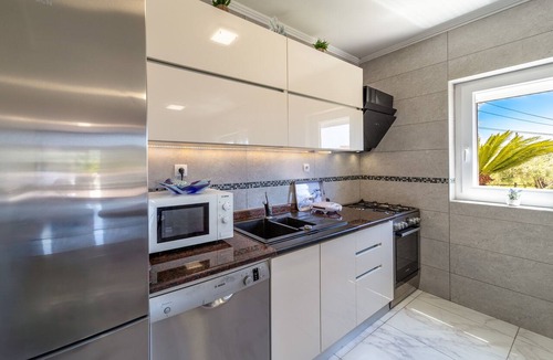 Kampor Apartment | Three bedroom apartment with a swimming pool Kampor, Rab (A-23600-a)