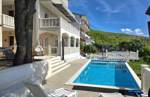 Lokva Rogoznica Apartment | Two bedroom apartment with a swimming pool Lokva Rogoznica, Omiš (A-25508-a)