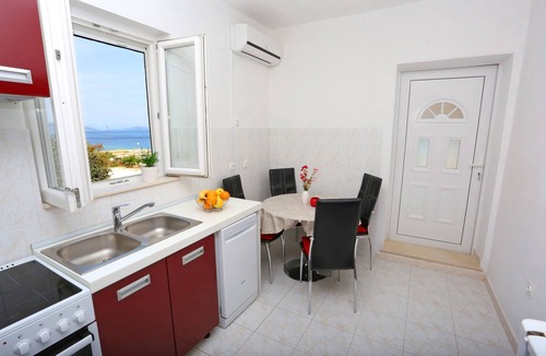 Drvenik Mali Apartment | Two bedroom apartment with terrace and sea view Drvenik Mali, Drvenik (A-15535-a)