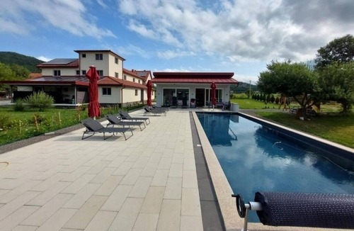 Otocac Apartment | Two bedroom apartment with a swimming pool Otočac, Velebit (A-24987-c)