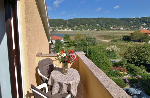 Supetarska Draga Apartment | Two bedroom apartment with balcony and sea view Supetarska Draga - Donja, Rab (A-4954-b)