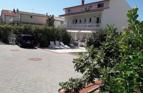 Rab Apartment | Vacation Home Daisy with Private Terrace, Wi-Fi and Air Conditioning