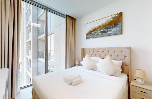 Nad Al Sheba Apartment | Vacationer Holiday Homes l Elegant 1 Bedroom l in Meydan l Community Views