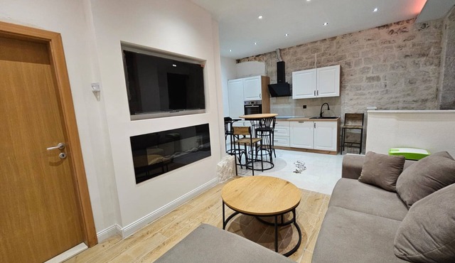 Apartment Antonio on the seafront in Kastela