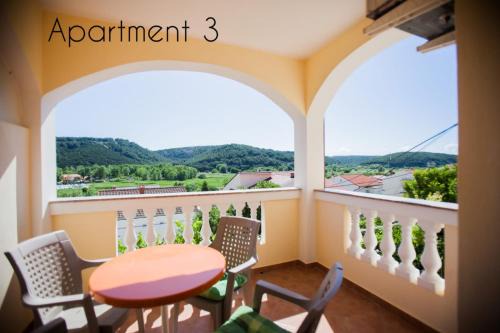Apartment in Lopar with balcony, air conditioning, W-LAN, washing machine (186-3) in Lopar