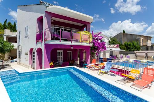 Beachfront villas Pinky-Superior heated pools and jacuzzi just 25 m from see
