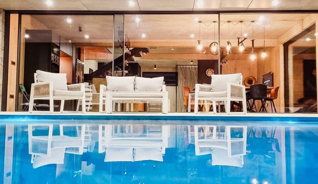 Designer villa with private garden and a pool