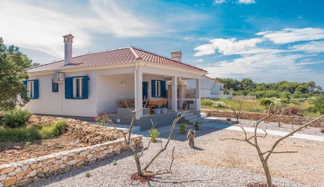 "Ena" mit Blick auf das Wasser by Interhome
