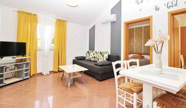 Holiday apartment with air conditioning and balcony