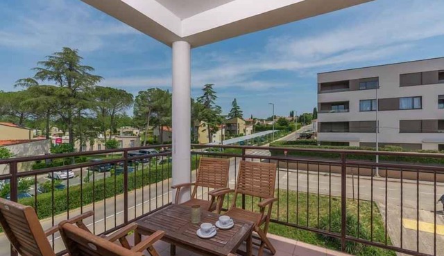 Holiday apartment with air conditioning and balcony